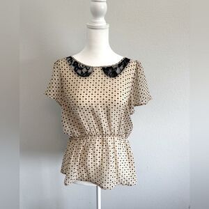 Peplum polka dot blouse